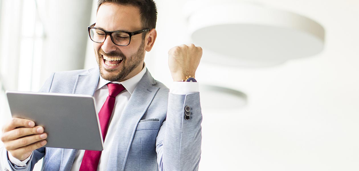 Non-QM Loan Programs For Borrowers. Happy client smiling with iPad